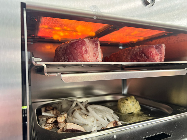 uncooked meat and vegetables on the Schwank Infrared Grill