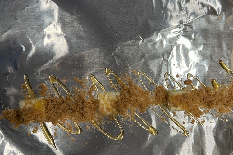 butter, brown sugar and honey on aluminum foil