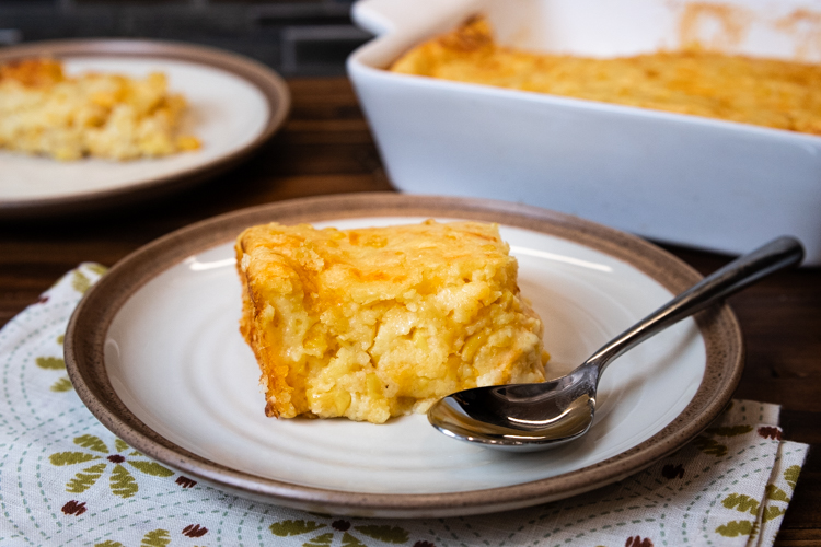 three cheese corn pudding in a bowl