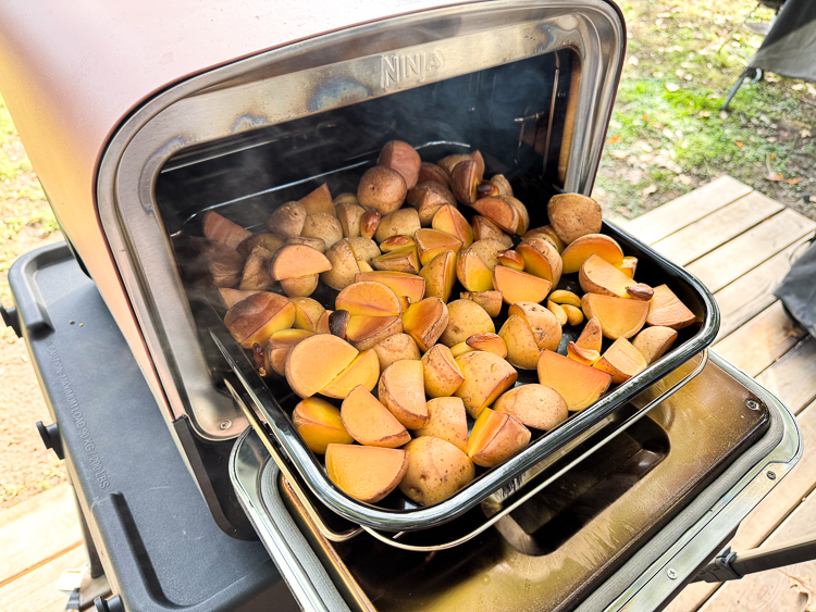 a tray of potatoes in the ninja woodfire oven