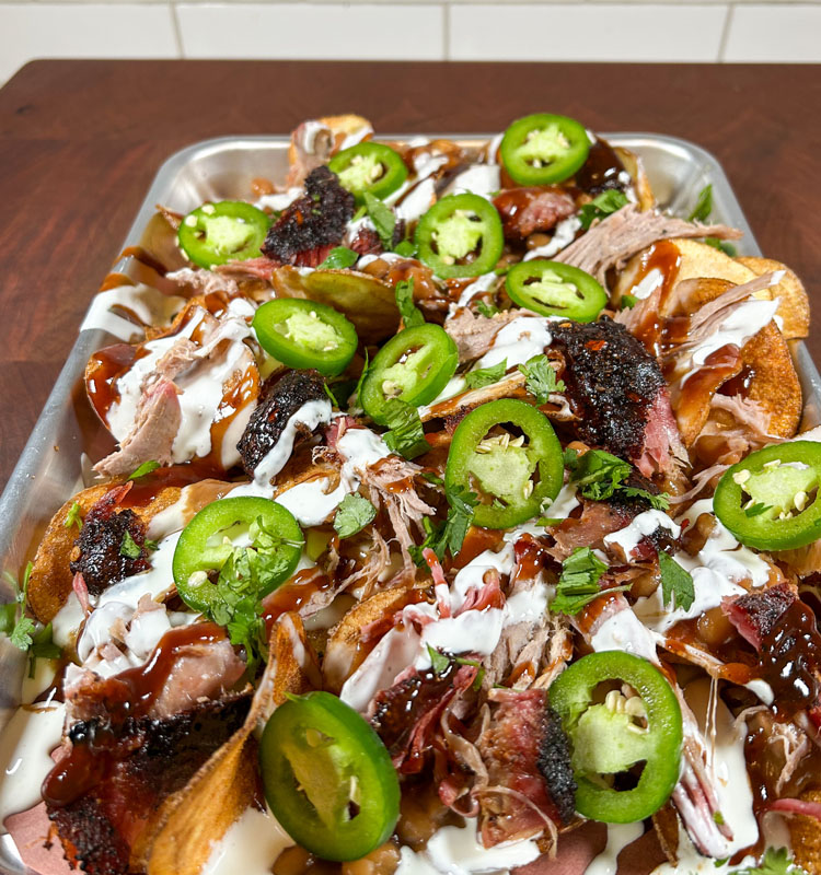 red neck nachos topped with jalapenos