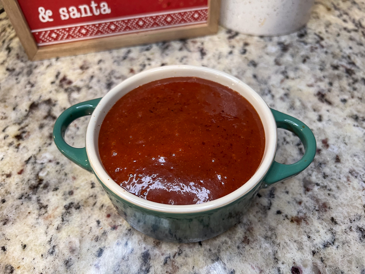 a bowl of cranberry glaze