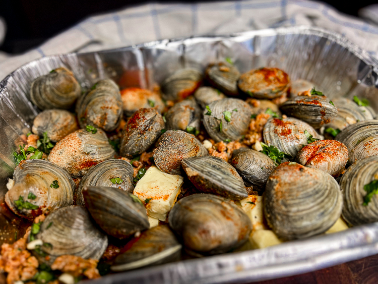 clams in an aluminum tray