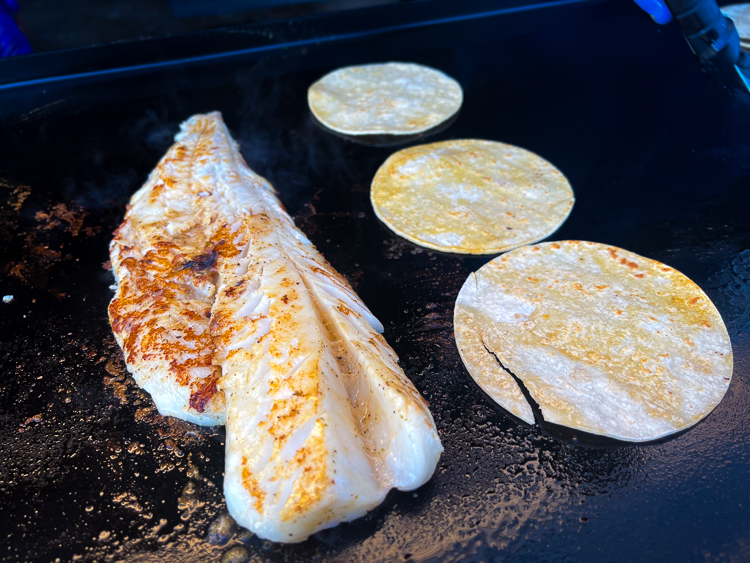 cod and tortillas on the grill