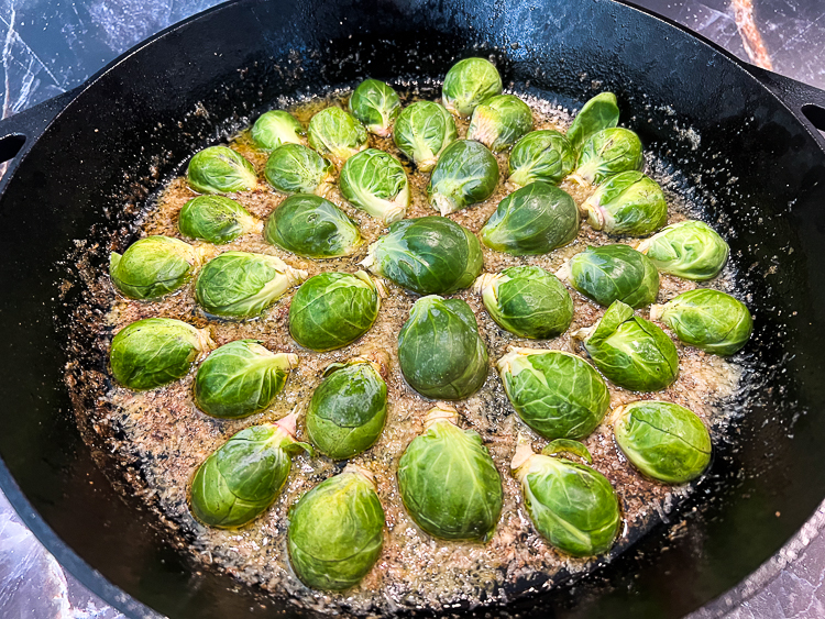 a skillet full of brussels sprouts