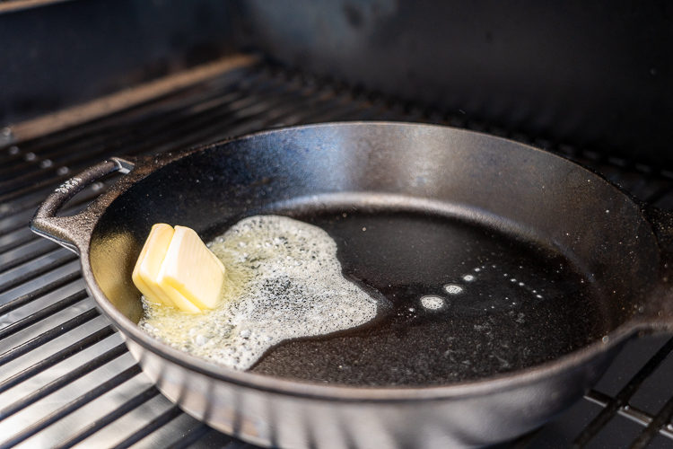 butter sizzling in a hot skillet