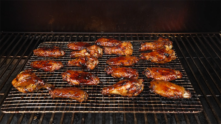 chicken wings smoking on the Pit Boss Pro Series 1600 Elite pellet grill